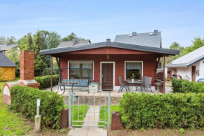 Ferienhaus mit naturnahen Badeteich